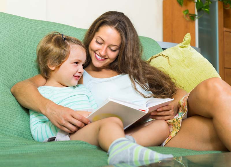 parents and children reading books together